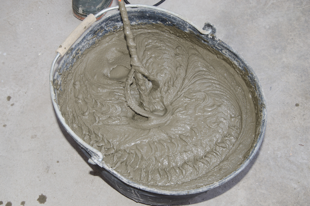 mixing bucket with unused plaster